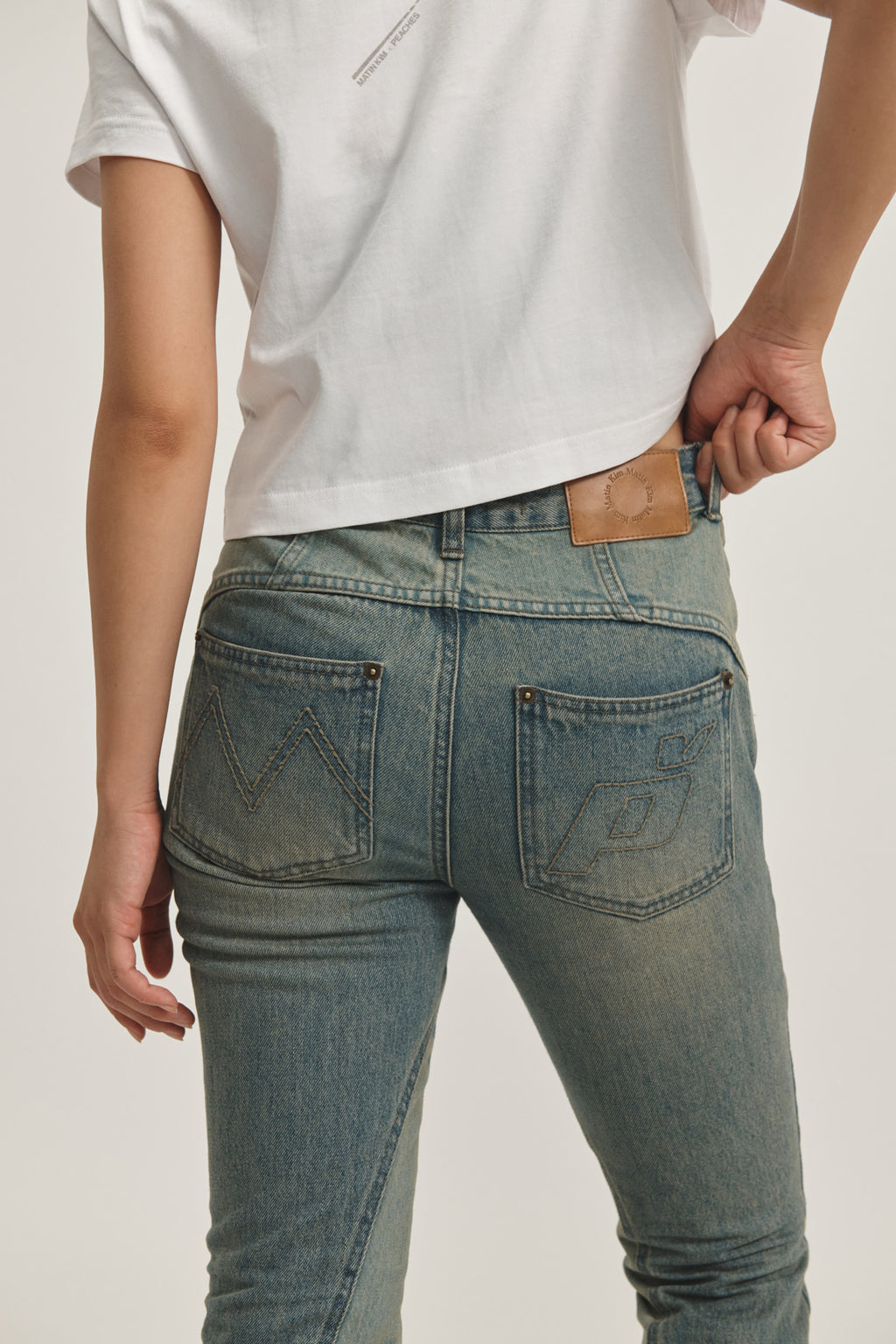 Matin Kim - Peaches Zipper Detail Boots Cut Denim Pants (Light Blue) product image 13 | TRAB K-Fashion Australia