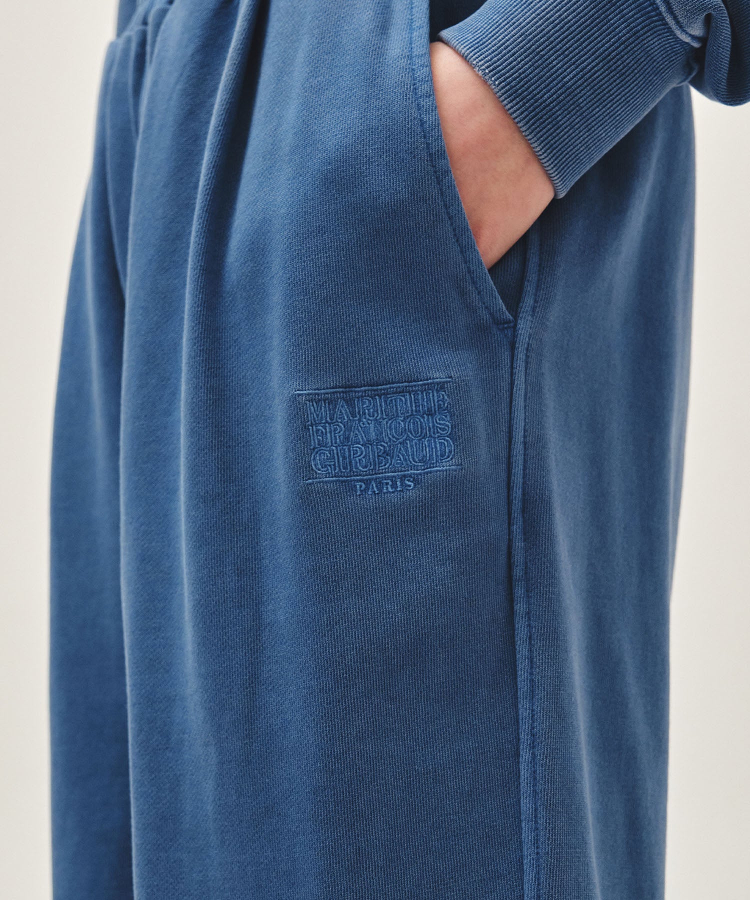 Marithe & Francois Girbaud - Outline Classic Logo Dyeing Tuck Wide Sweat Pants (Blue) product image 2 | TRAB K-Fashion Australia