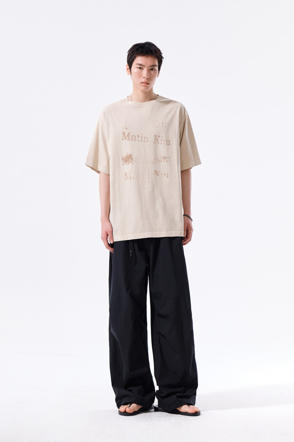 Matin Kim - [Pre-Order – Ships June 22] Pigment Graffiti Logo Top (Beige) product image 13 | TRAB K-Fashion Australia
