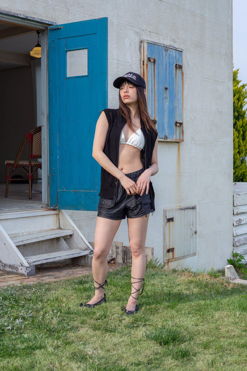 Matin Kim - Back Logo High Neck Knit Vest (Black) product image 9 | TRAB K-Fashion Australia