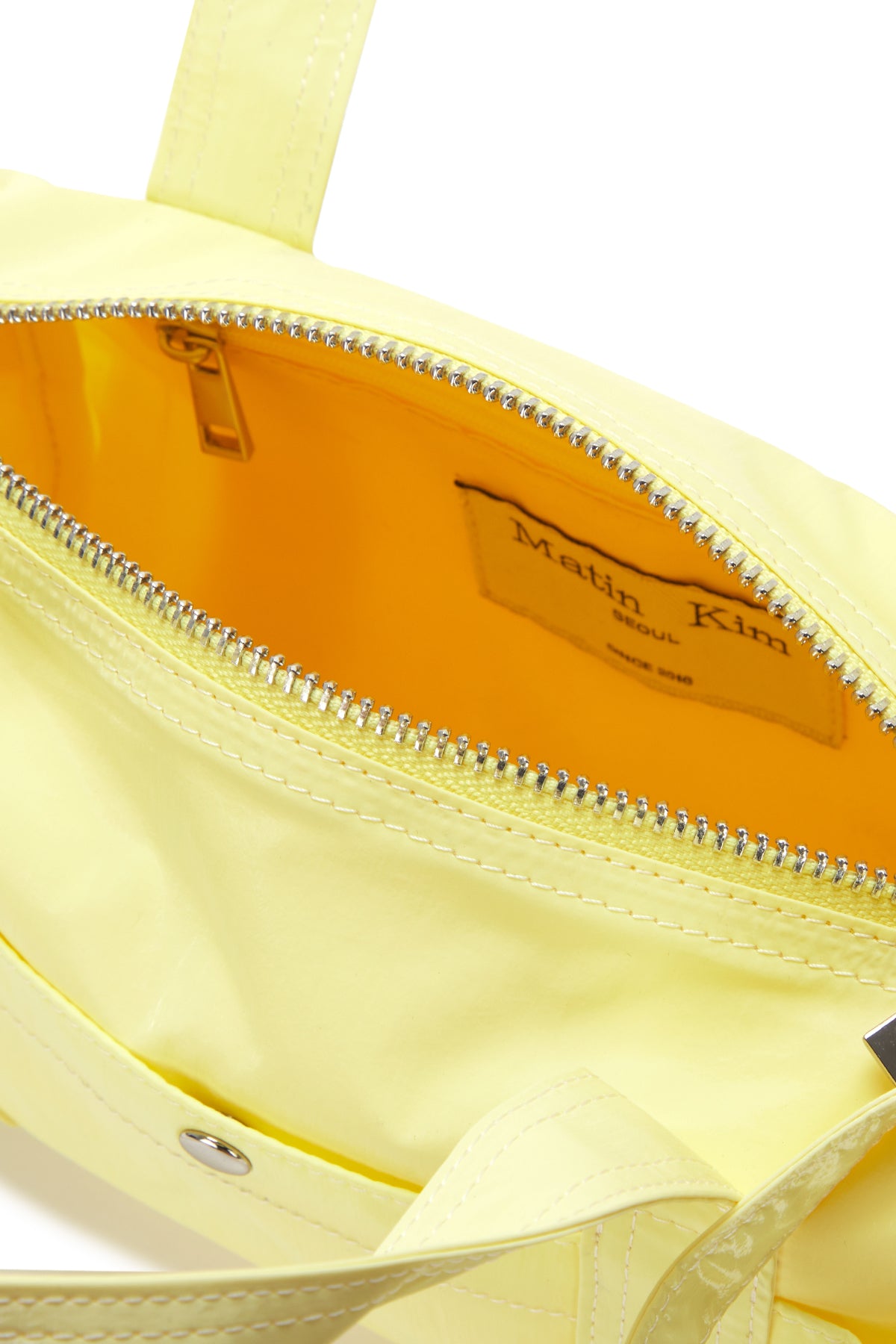 Matin Kim - Glossy Logo Sporty Mini Duffel Bag (Light Yellow) product image 3 | TRAB K-Fashion Australia