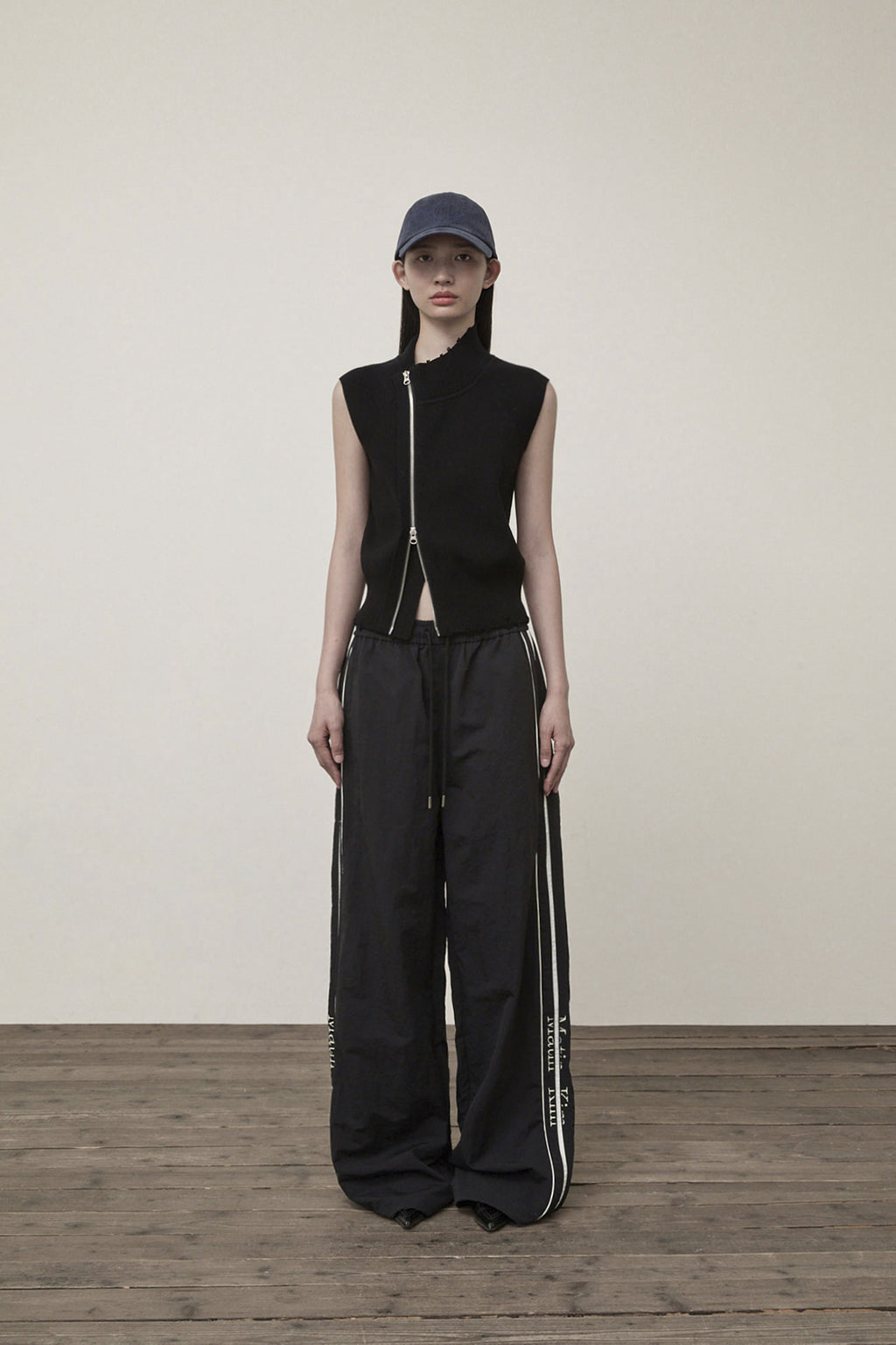 Matin Kim - High Neck Logo Knit Zip Up Vest (Black) product image 6 | TRAB K-Fashion Australia