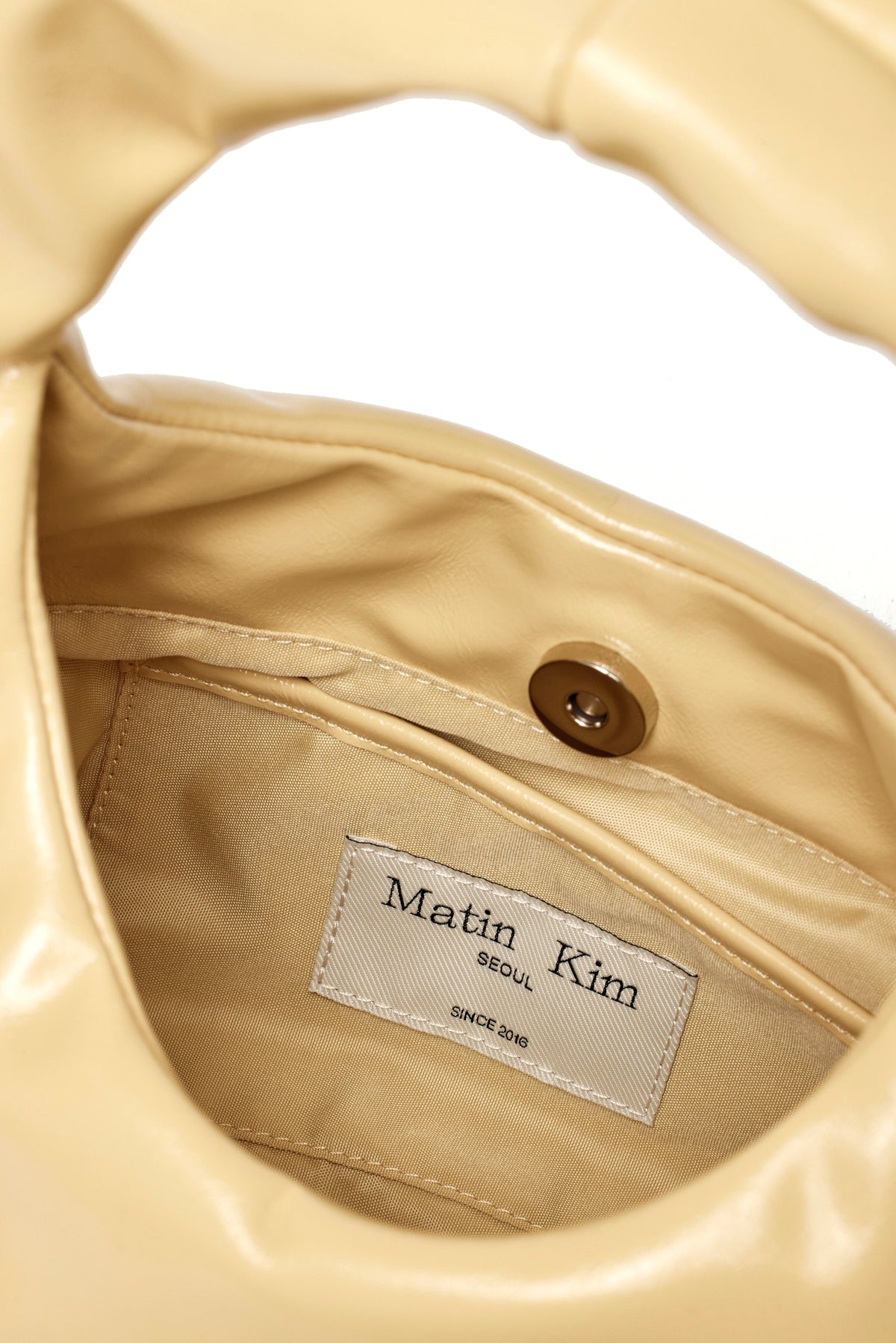 Matin Kim - Embossed Logo Leather Mini Tote Bag (Light Yellow) product image 4 | TRAB K-Fashion Australia