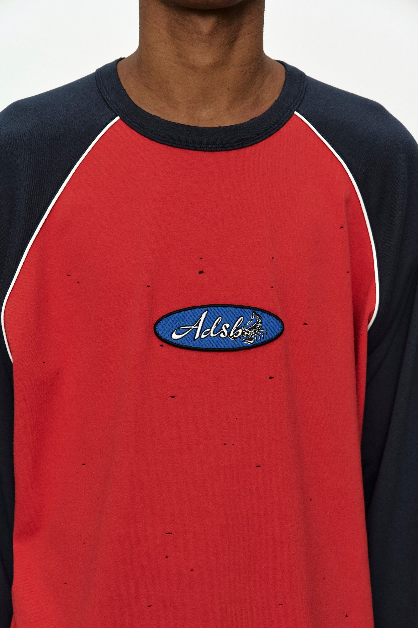 Andersson Bell - Logo Wappen Raglan L/s T-Shirt (Red/Navy) product image 5 | TRAB K-Fashion Australia