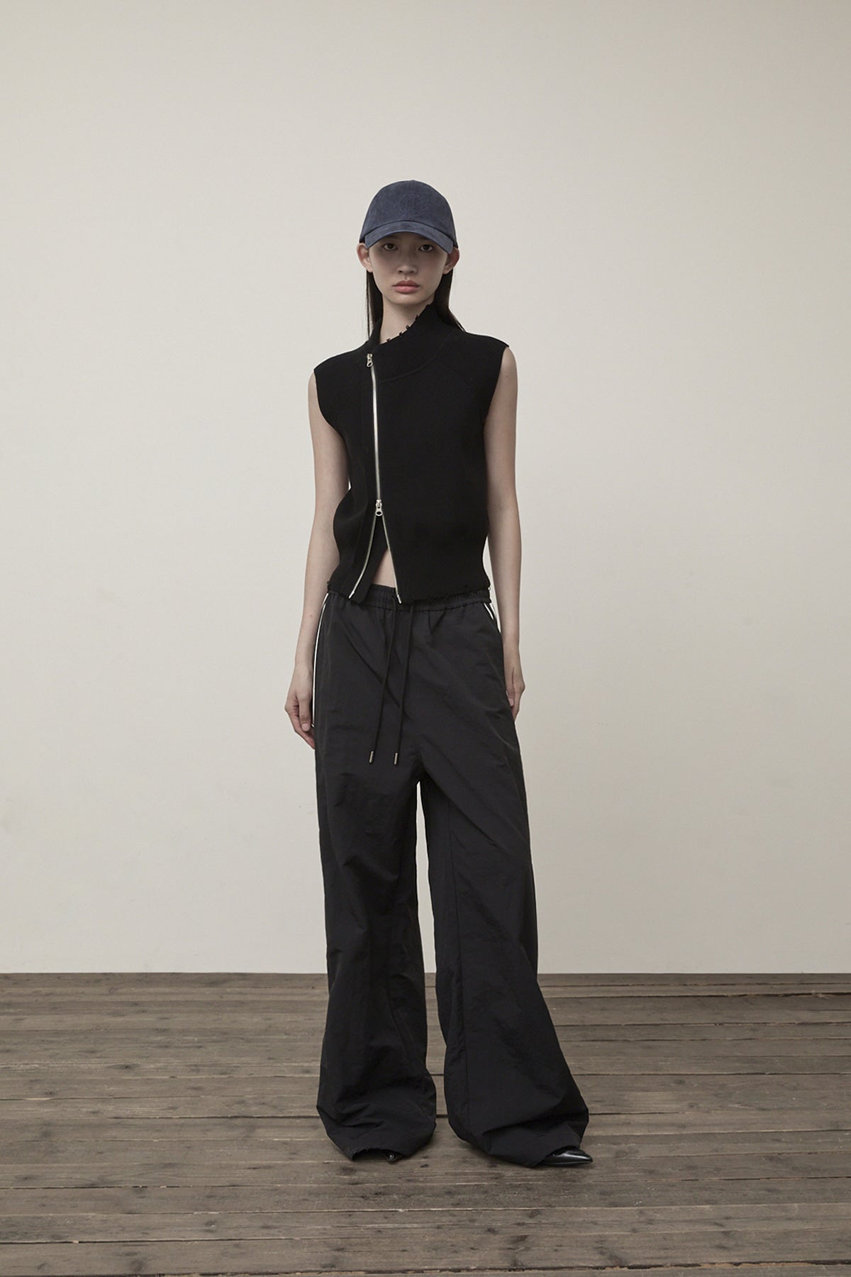 Matin Kim - High Neck Logo Knit Zip Up Vest (Black) product image 9 | TRAB K-Fashion Australia