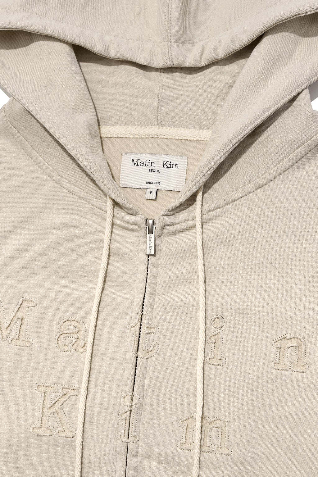 Matin Kim - Applique Cutted Logo Hoody Zip Up (Beige) product image 3 | TRAB K-Fashion Australia