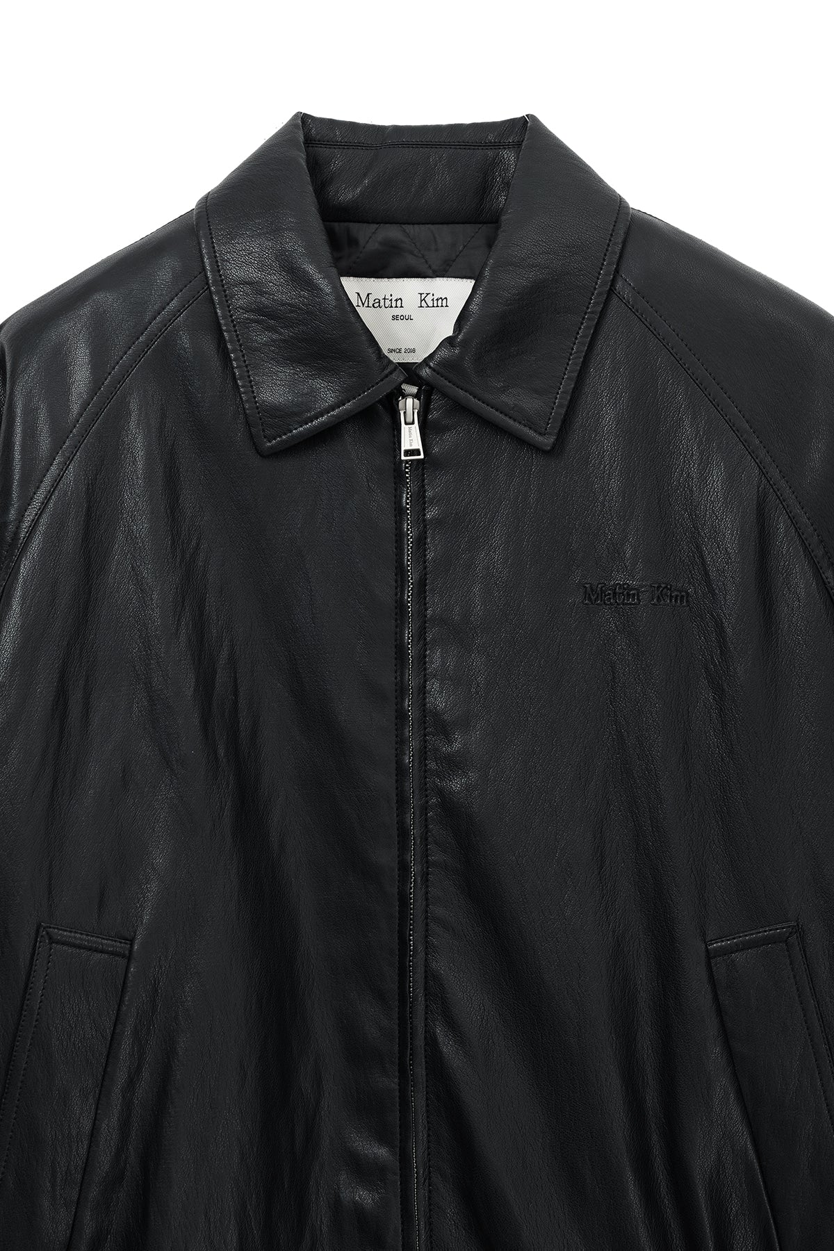 Matin Kim - Small Logo Quilted Faux Leather Zip Up Jumper (Black) product image 3 | TRAB K-Fashion Australia