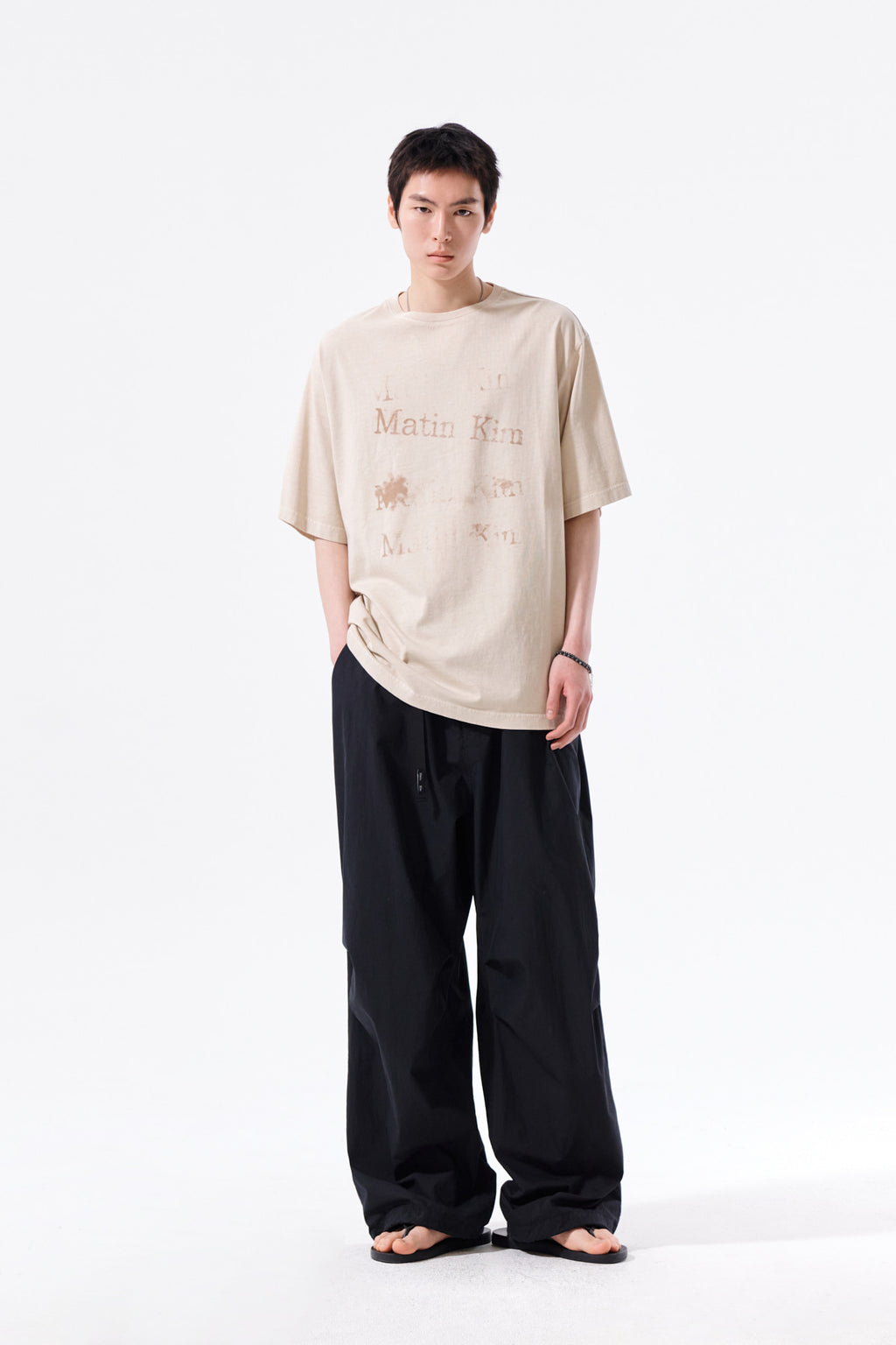 Matin Kim - [Pre-Order – Ships June 22] Pigment Graffiti Logo Top (Beige) product image 14 | TRAB K-Fashion Australia
