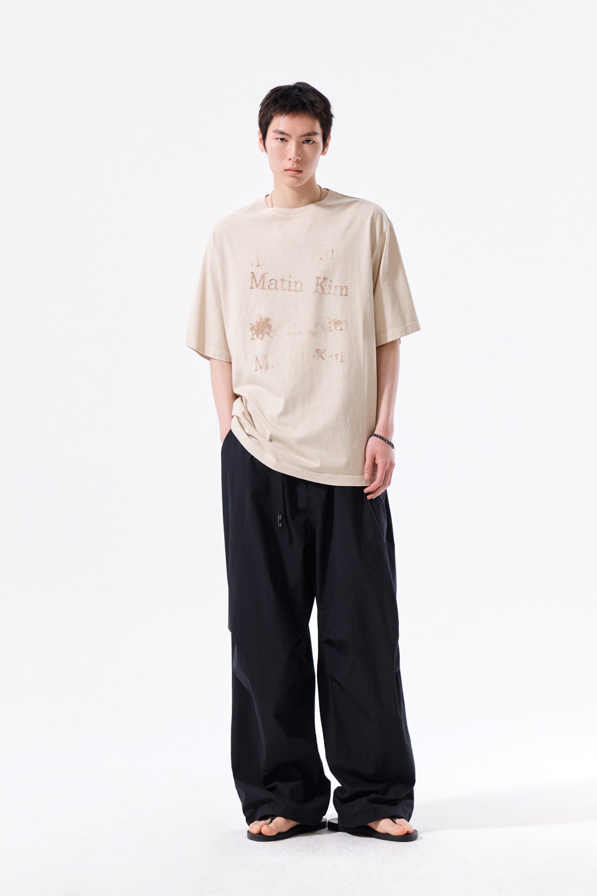Matin Kim - [Pre-Order – Ships June 22] Pigment Graffiti Logo Top (Beige) product image 14 | TRAB K-Fashion Australia