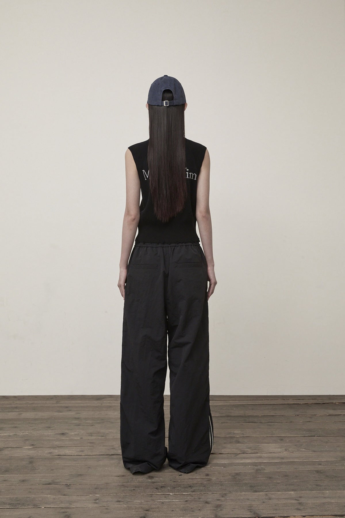 Matin Kim - High Neck Logo Knit Zip Up Vest (Black) product image 8 | TRAB K-Fashion Australia