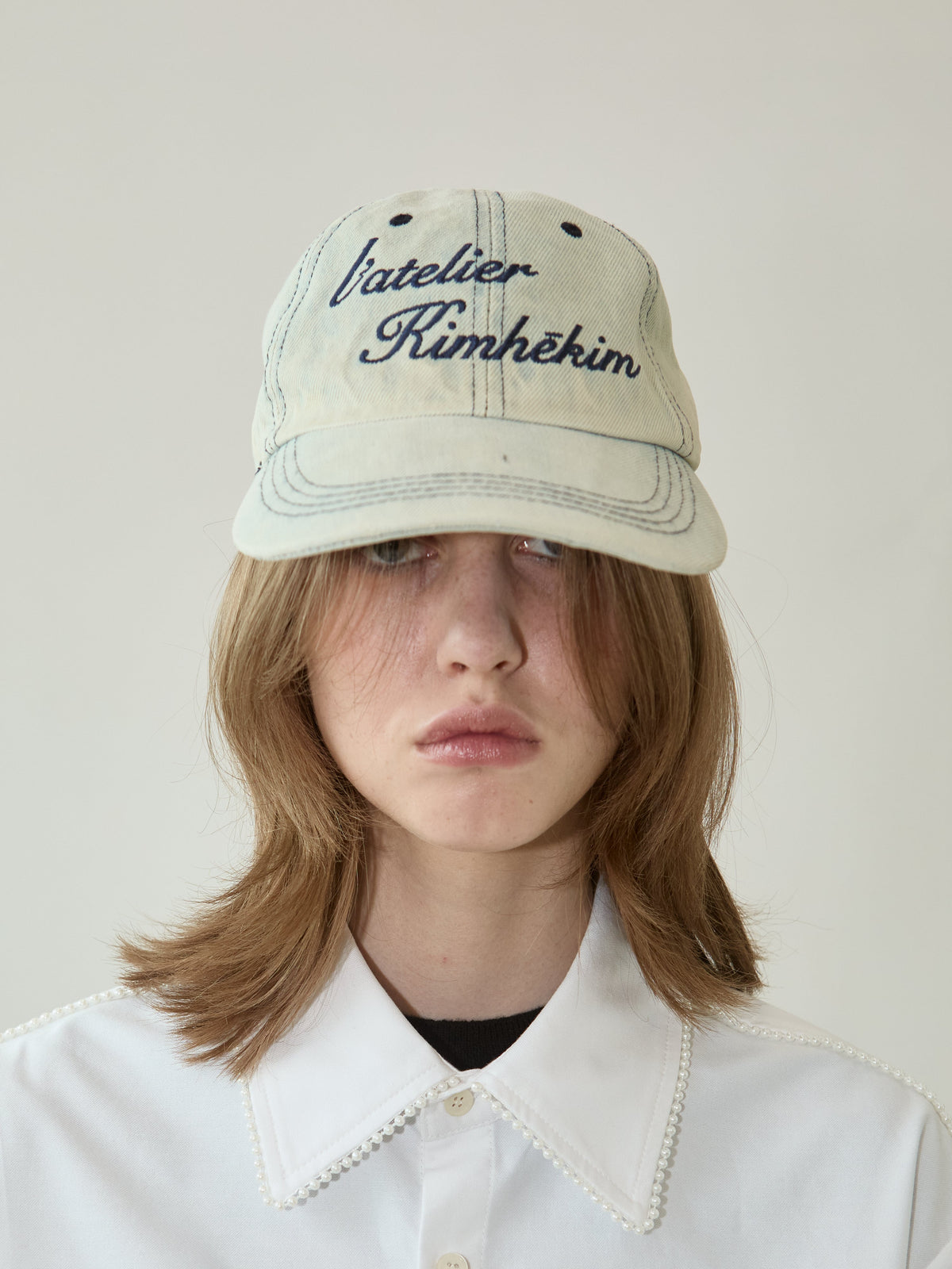 Kimhe Kim - Washed Atelier Embroidered Denim Ball Cap (Sky Blue) product image 1 | TRAB K-Fashion Australia