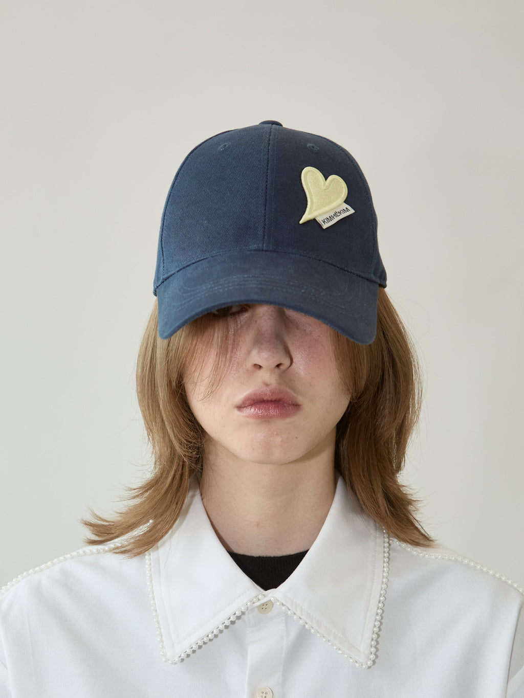 Kimhe Kim - Heart Patch Ball Cap (Navy/Yellow) product image 1 | TRAB K-Fashion Australia