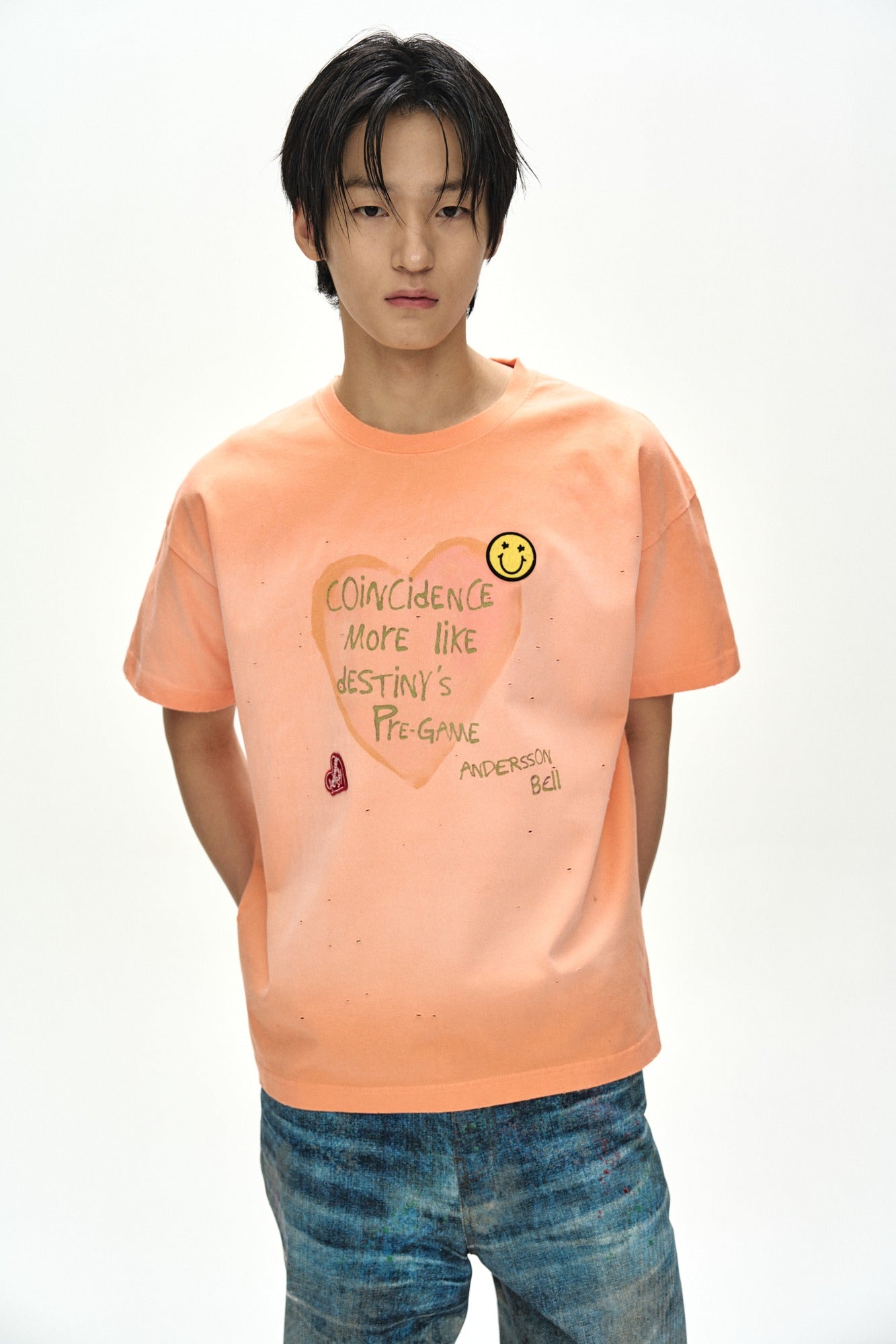 Andersson Bell - (essential) Unisex Spray Washed Heart Message T-Shirt (Orange) product image 1 | TRAB K-Fashion Australia