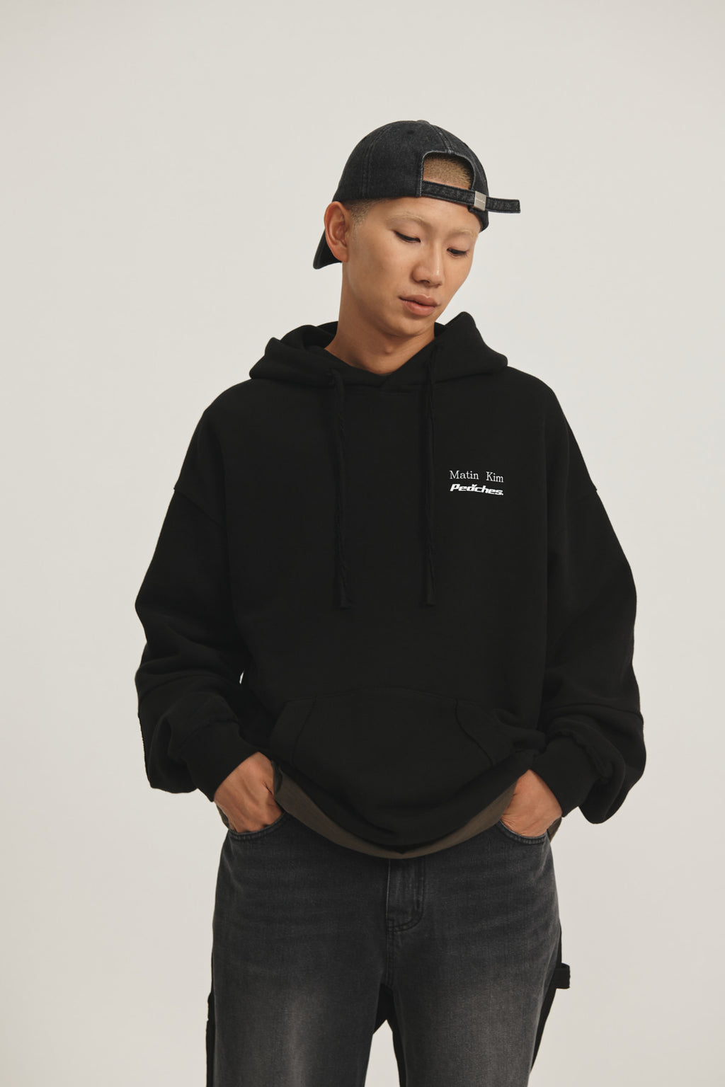 Matin Kim - Peaches Logo Graphic Hoody (Black) product image 1 | TRAB K-Fashion Australia