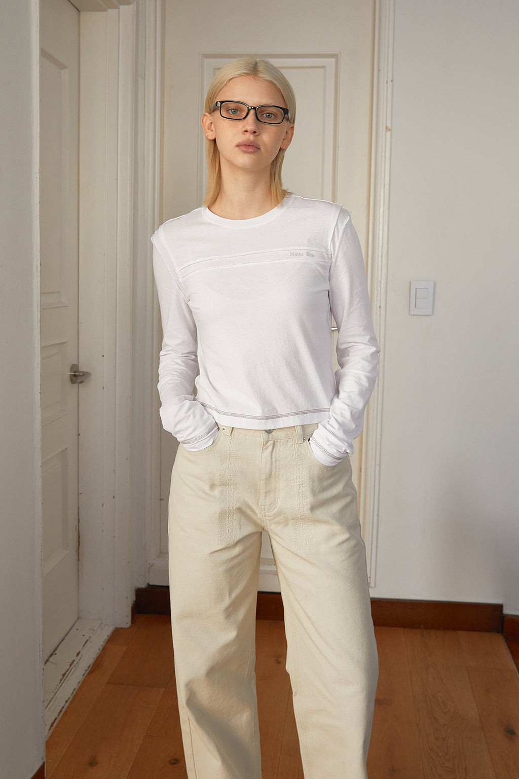 Matin Kim - Cut Line Detail Long Sleeve Logo Top (White) product image 10 | TRAB K-Fashion Australia