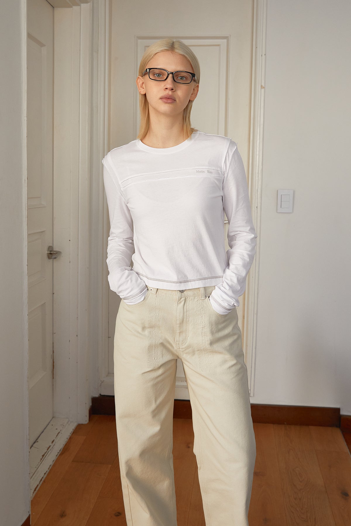 Matin Kim - Cut Line Detail Long Sleeve Logo Top (White) product image 10 | TRAB K-Fashion Australia