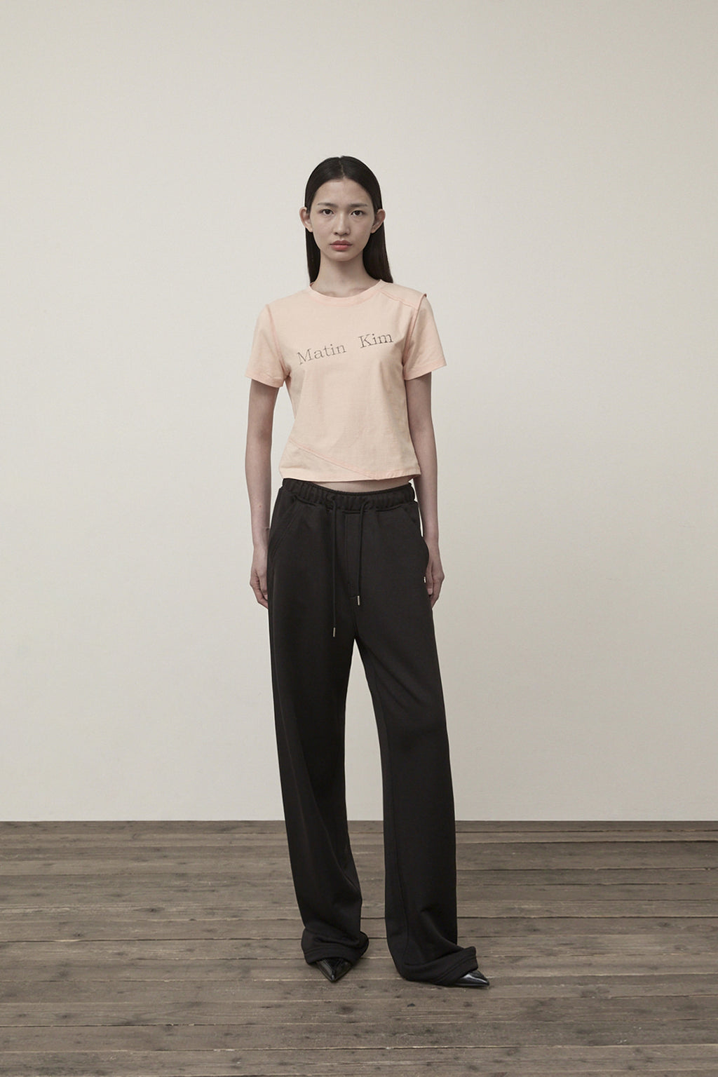 Matin Kim - Diagonal Logo Reversible Crop Top (Light Orange) product image 11 | TRAB K-Fashion Australia